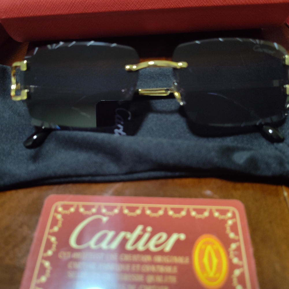Cartier Black and Gold Sunglasses